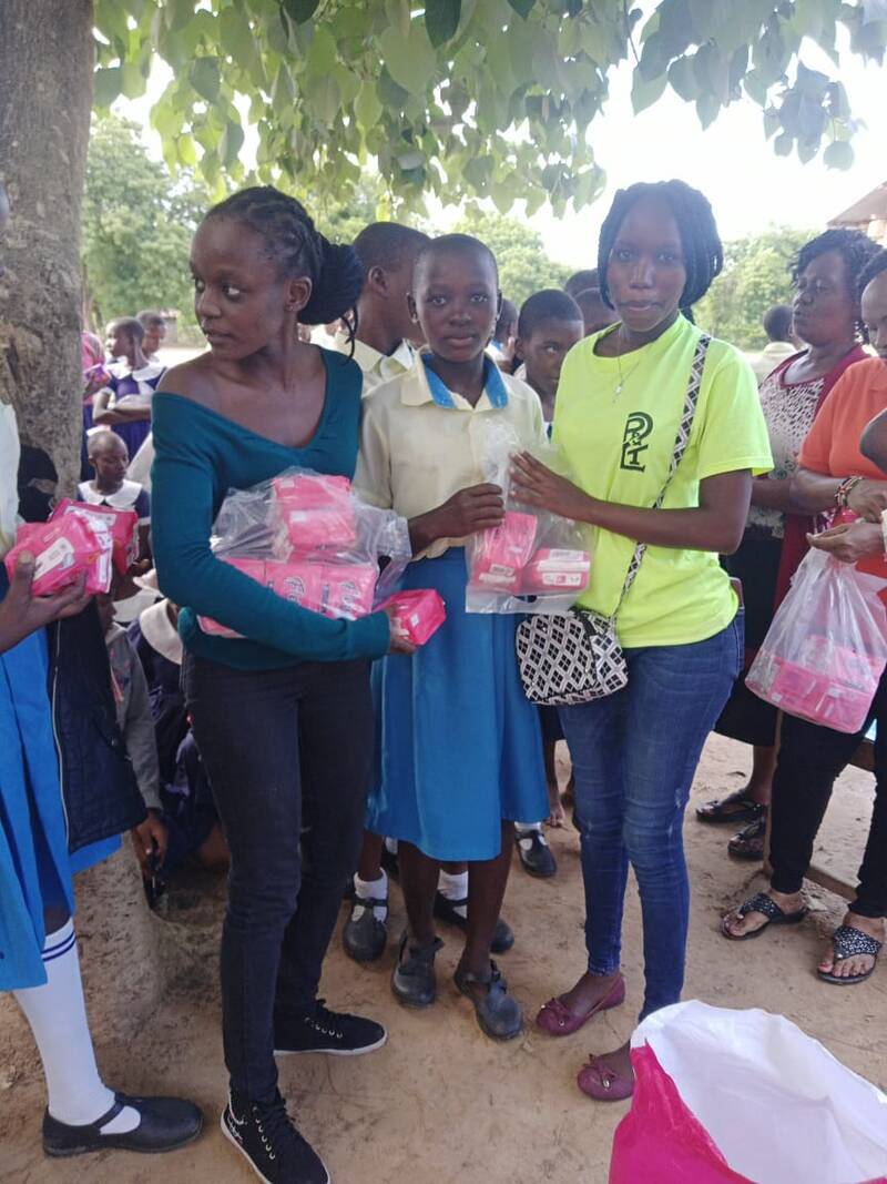 Sharon distributing dignity packs
