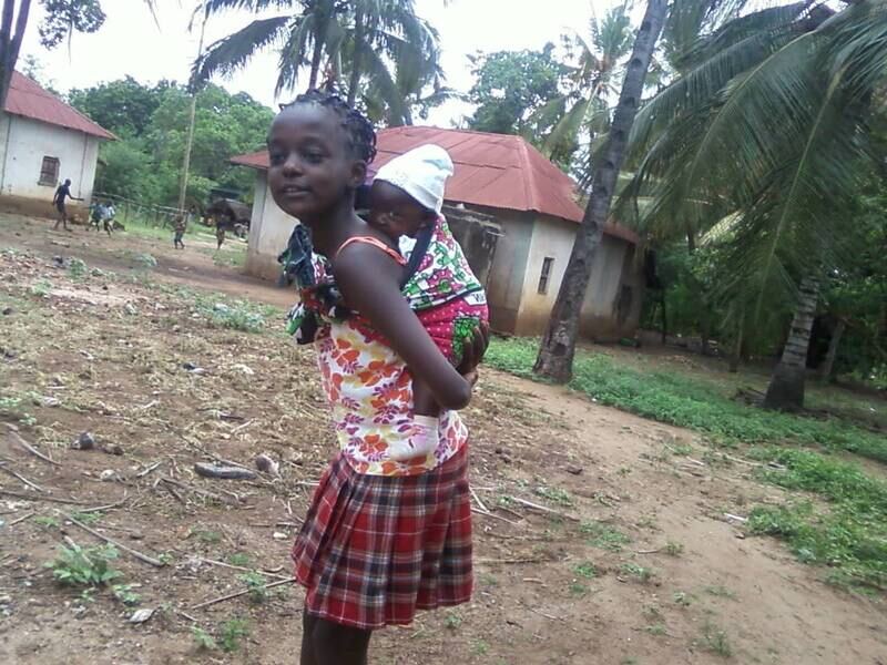 Sharon Carrying Baby